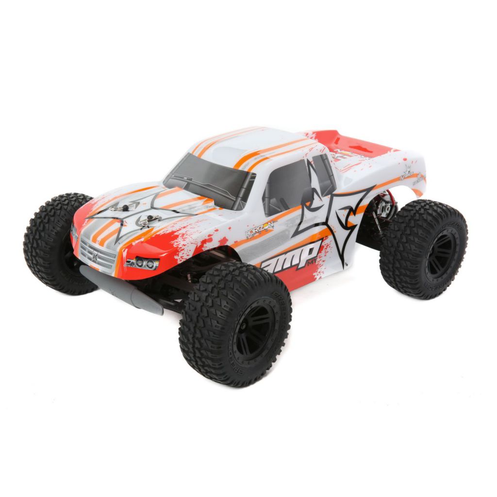 AMP MT 1/10 2WD Monster Truck: Blanc/Orange RTR INT - HORIZON HOBBY - R&eacute;f&eacute;rence: ECX03028IT1
