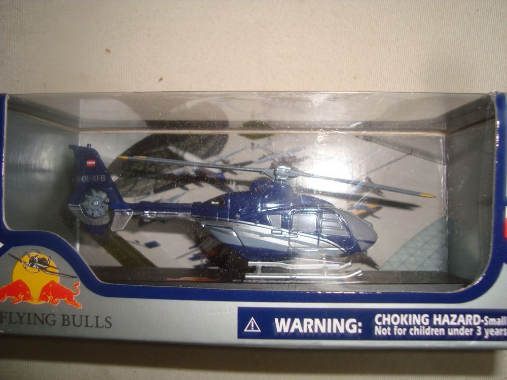 H&eacute;licopt&egrave;re AIRBUS EC135 1:100 - Red Bull - New Ray - 29833